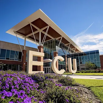 Photo of ECU campus showing large ECU sign