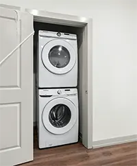 Woman doing a load of laundry at The Jolly Roger